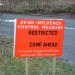 Sign warning about presence of avian flu